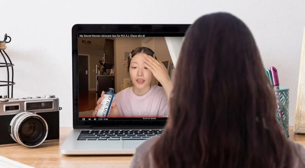 Alt text A person following a skincare routine tutorial